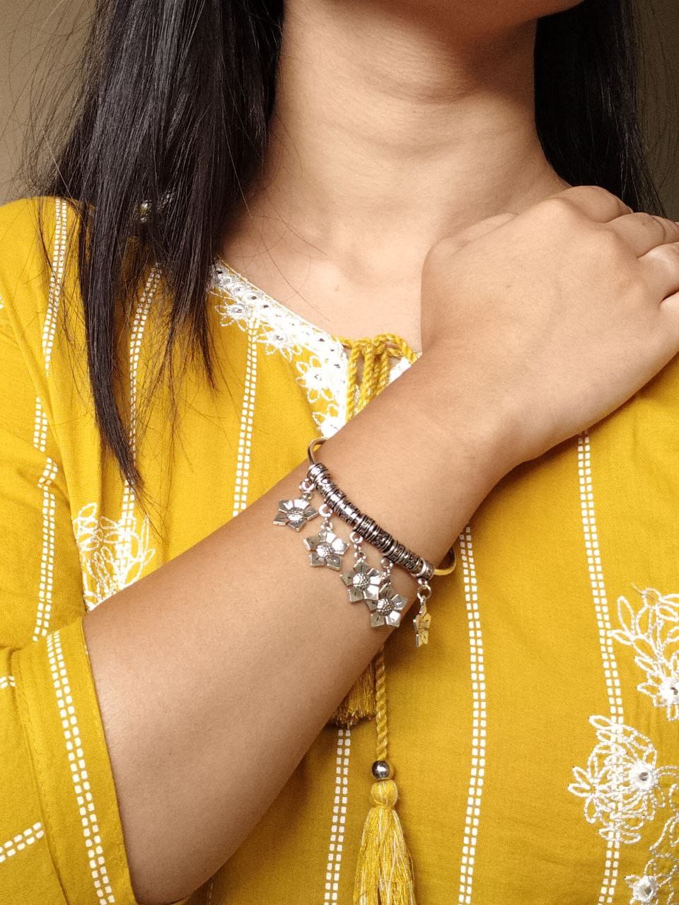 Tribal Style Silver Finish Floral Drop Bangle